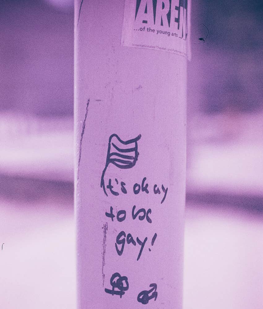 vintage image of affirming graffiti on pole showing life change
