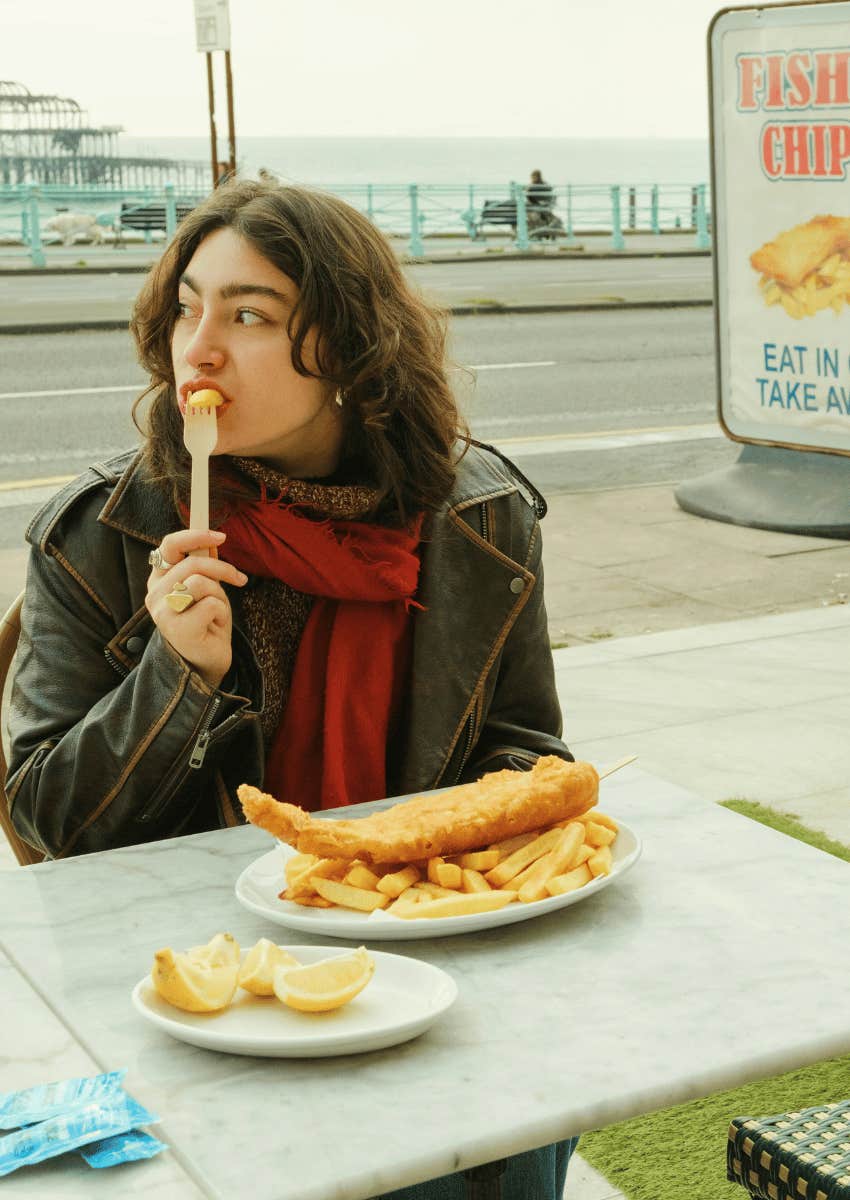 healing young woman eating alone in public
