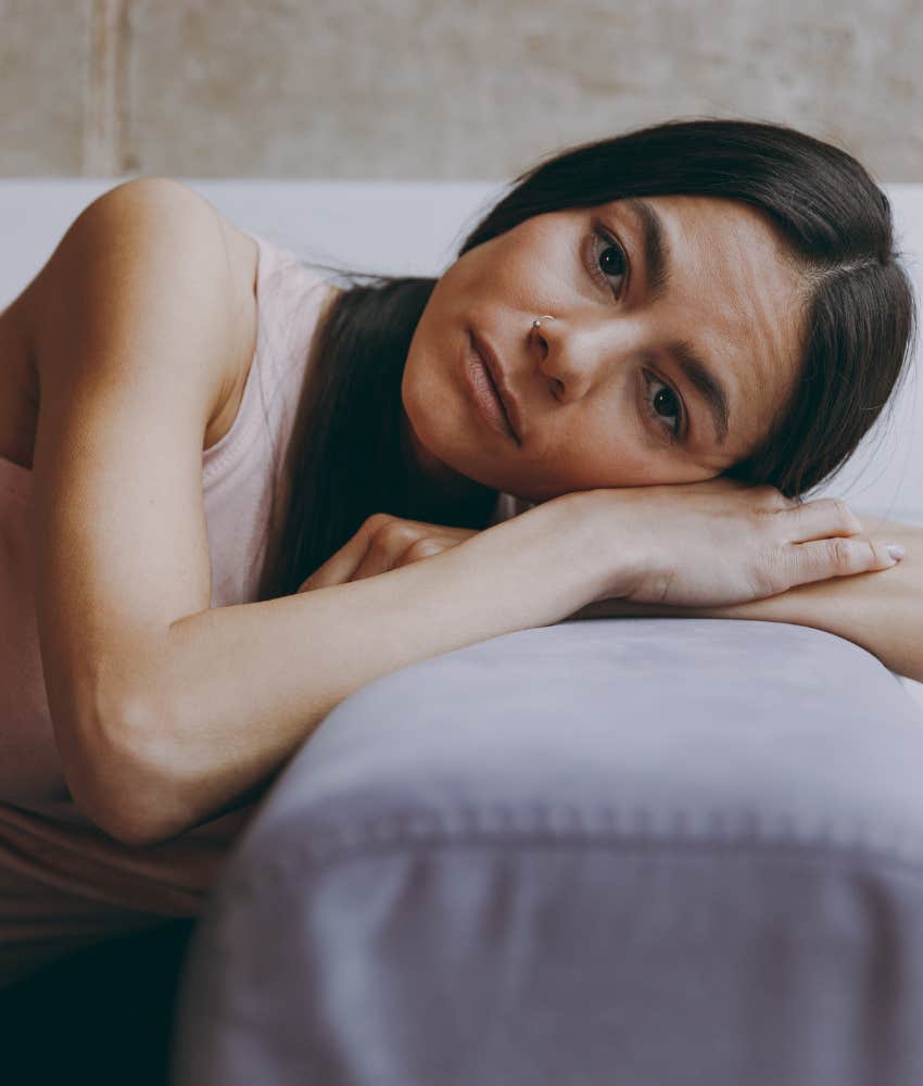 tired person rests head on arms showing internal resistance externalized