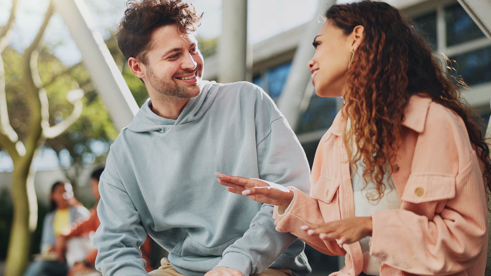 high-iq woman telling man I don't believe that anymore during conversation