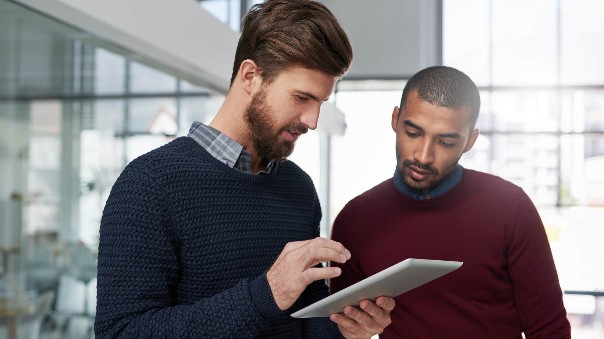 intelligent man telling colleague let me rephrase that