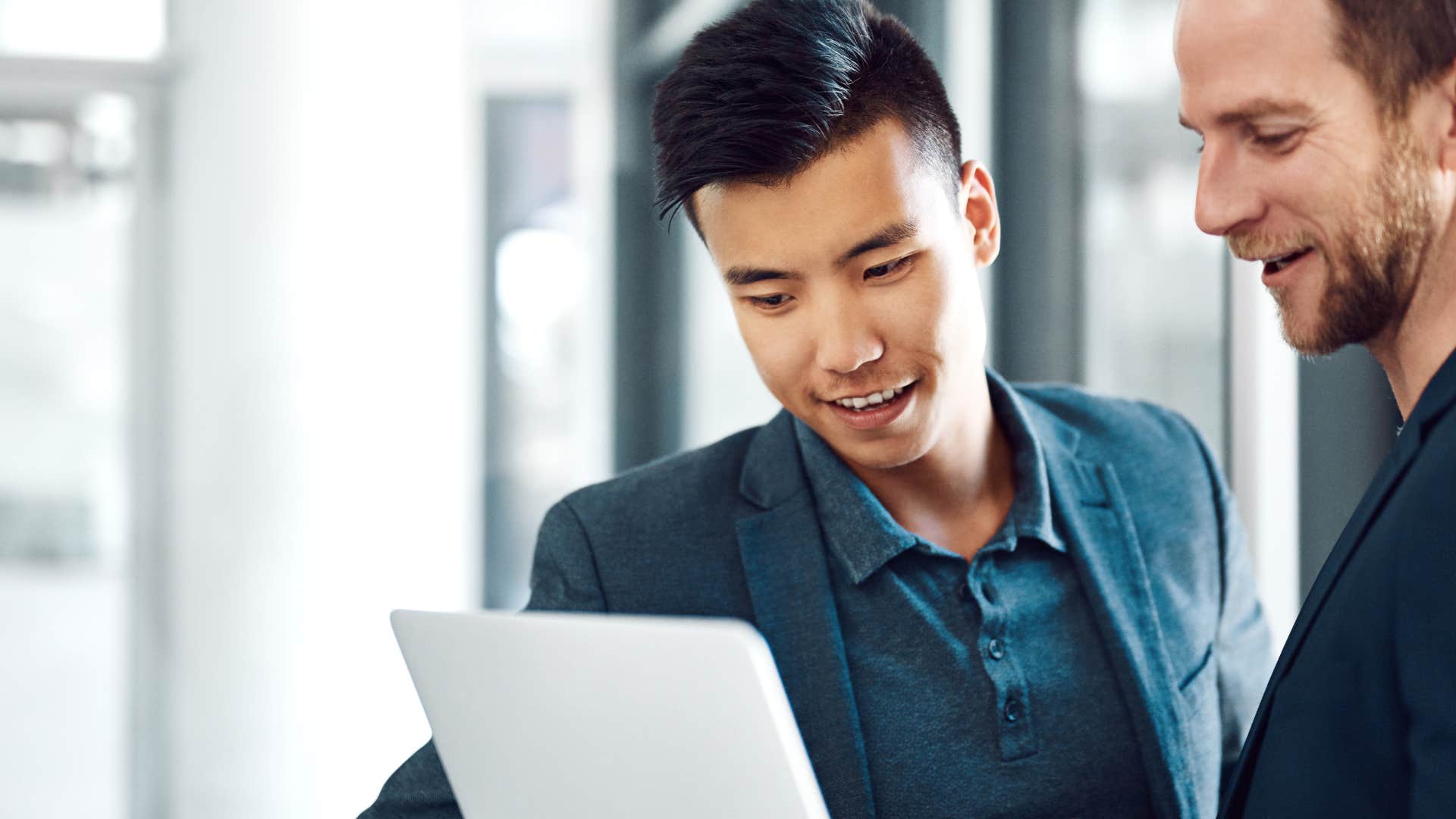 high-iq man talking to colleague using odd phrase tell me more about that