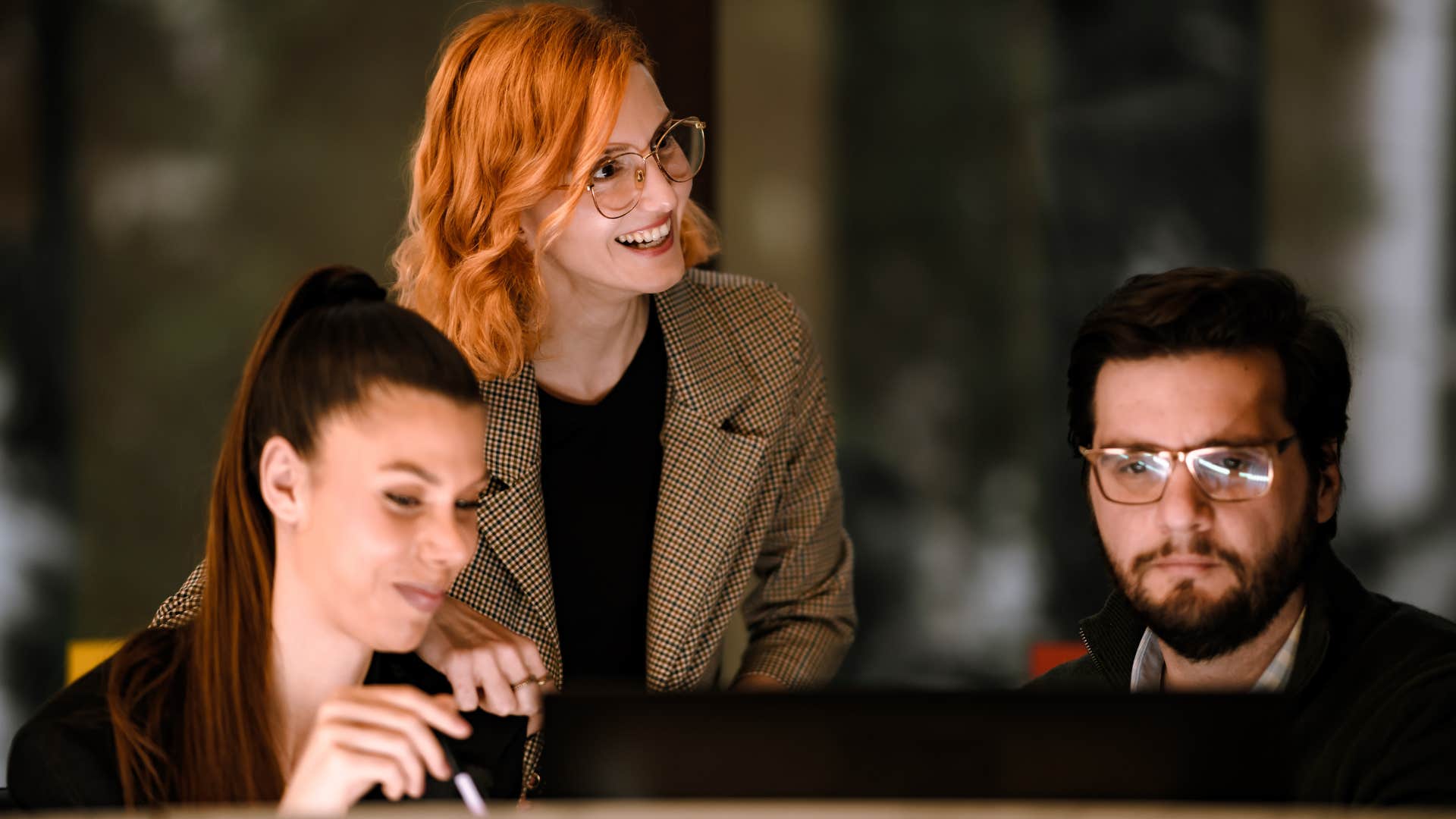 Woman who's intentional with their energy working with peers.