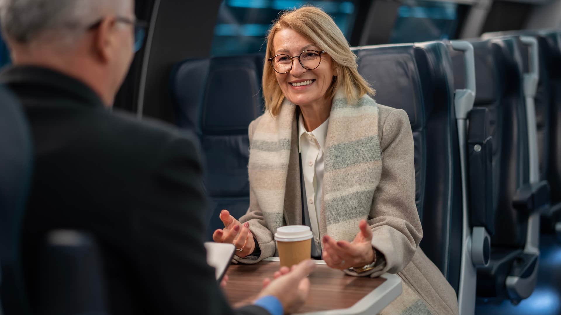 high-value woman excited having a conversation with stranger