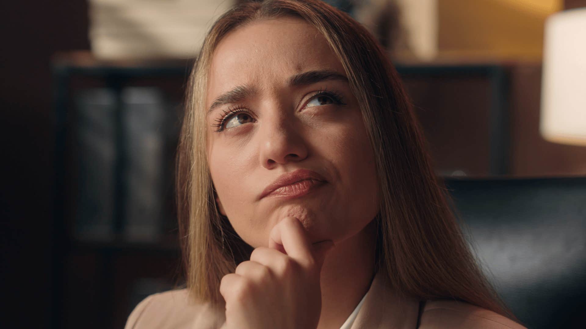 woman who is highly analytical as she notices logical fallacies