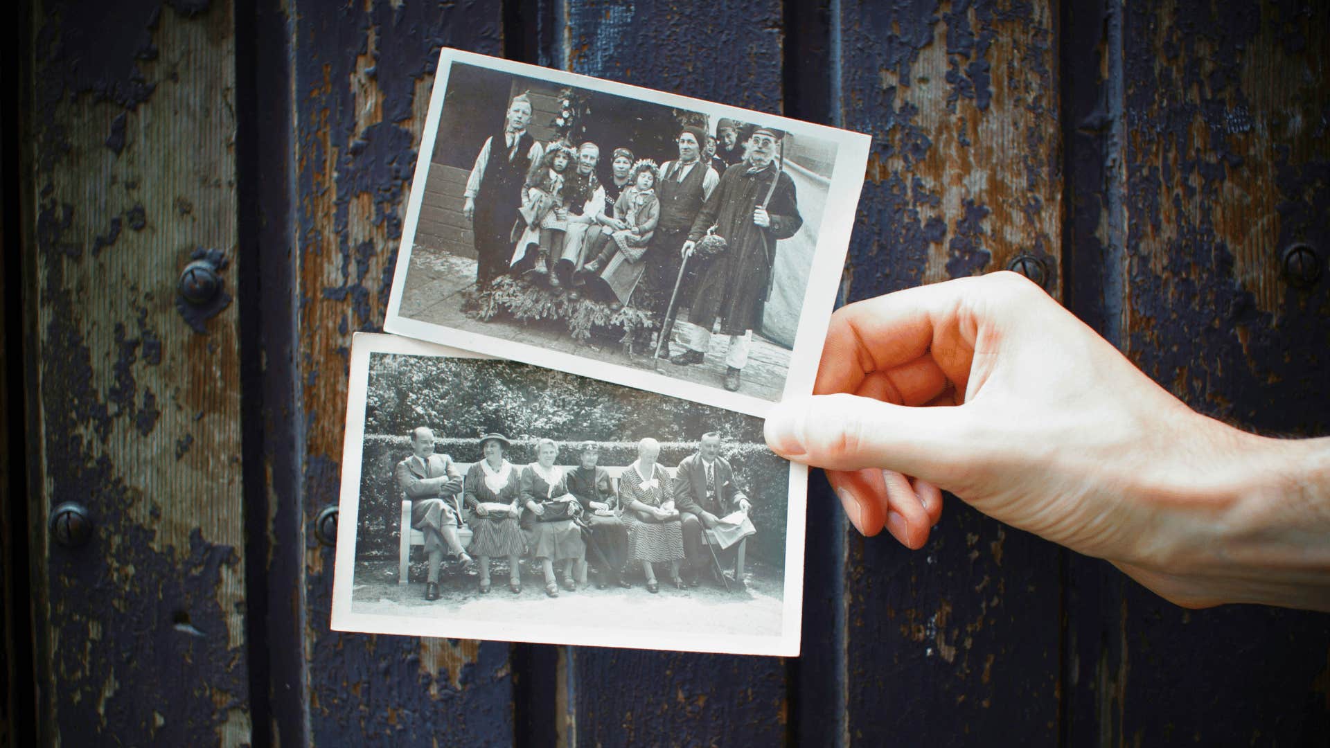 holding polaroid photos regretting collecting memories to revisit