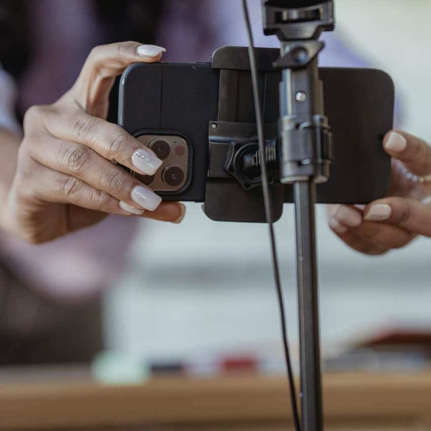 woman filming in public