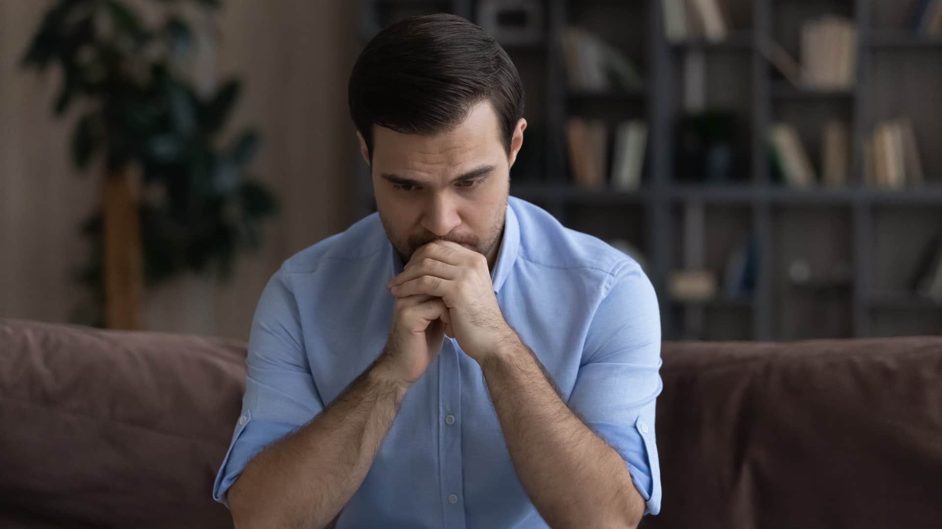 man feeling smaller instead of stronger thinking about his marriage