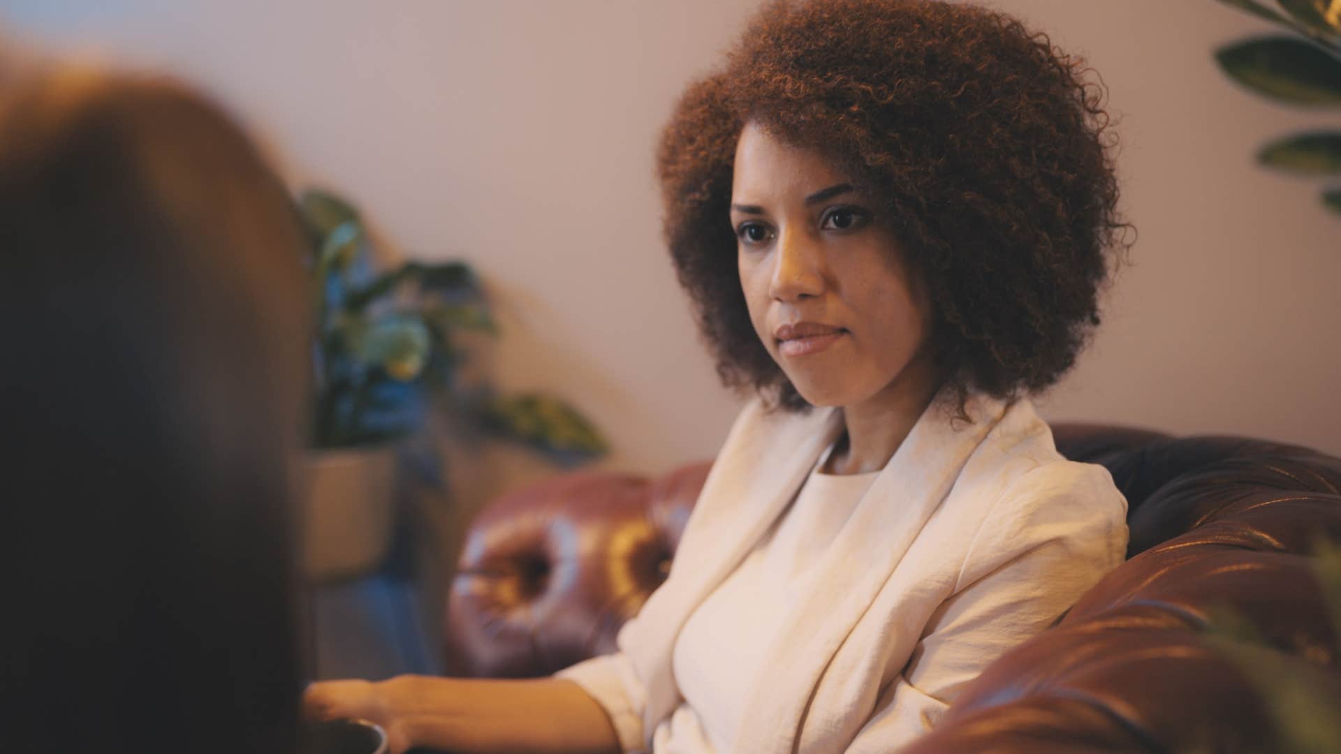 confident woman who craves depth and solitude looking at friend saying I'm not going to force this