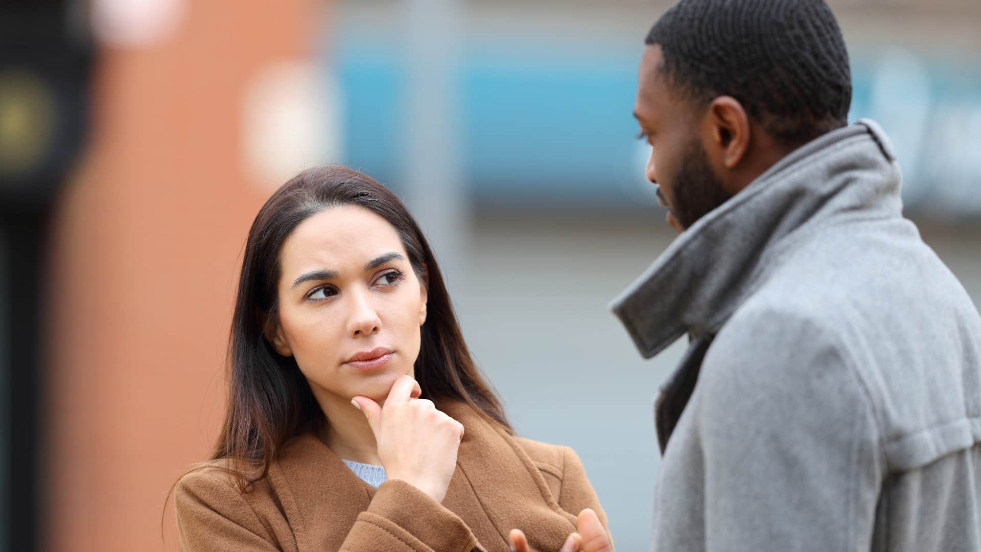 woman noticing man's body language in public