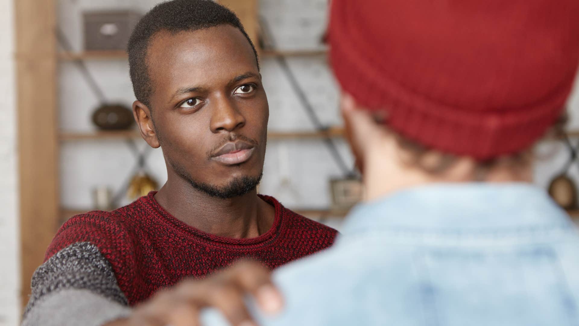emotionally mature man talking to acquaintance reassuring him