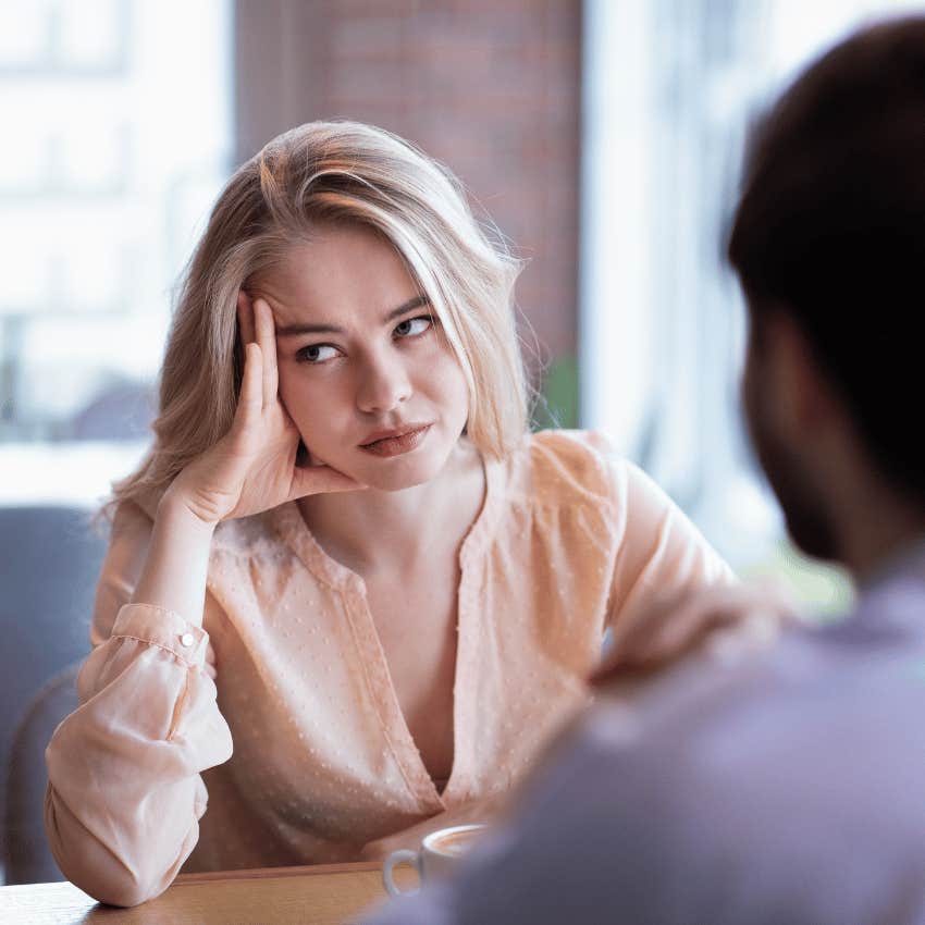 smart woman in a bad mood because of surface level conversations