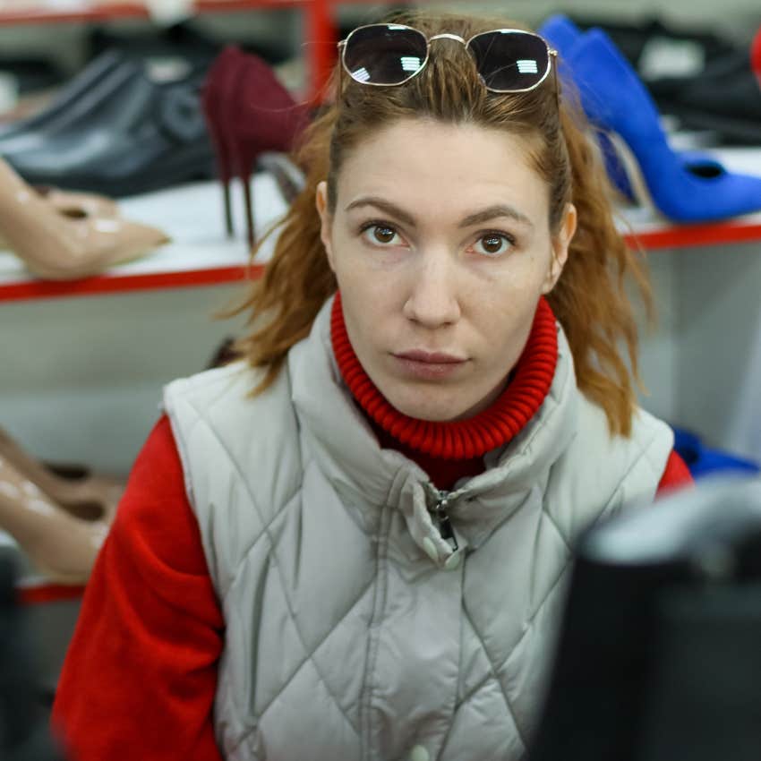 Woman looking for new clothes in a store