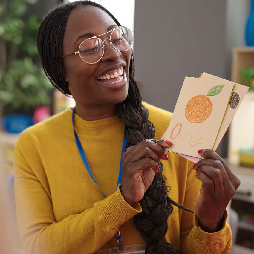 woman who can afford childcare reading to kids at work
