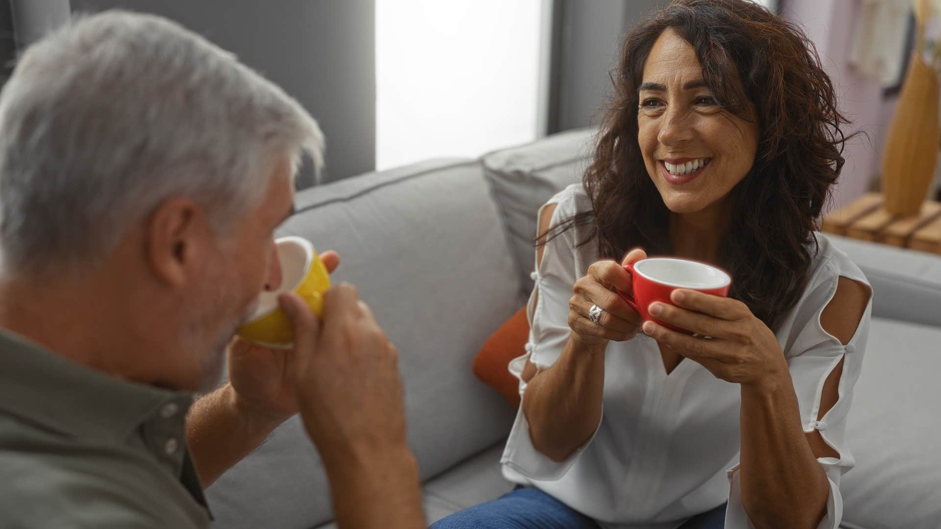 couple drinking tea not comparing their relationship to others