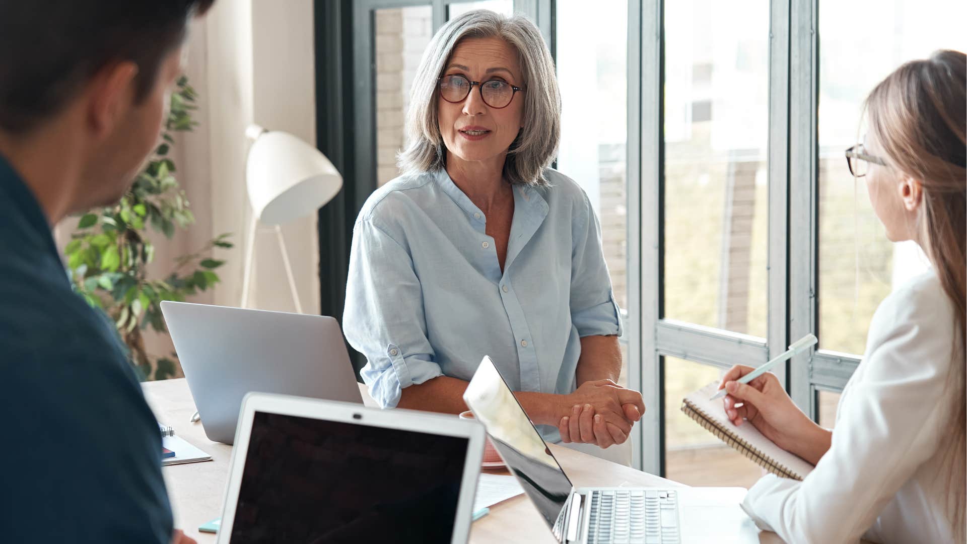 Sincere leader talks to staff showing authenticity as trait
