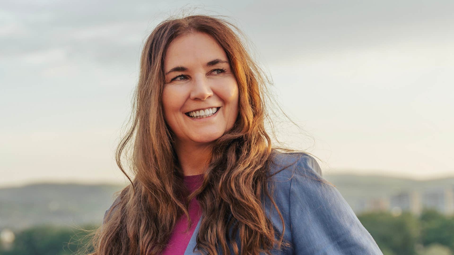 Proud person smiles showing habit of responsibility