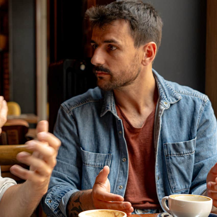 anxious man feeling pressured to be inauthentic talking to a friend