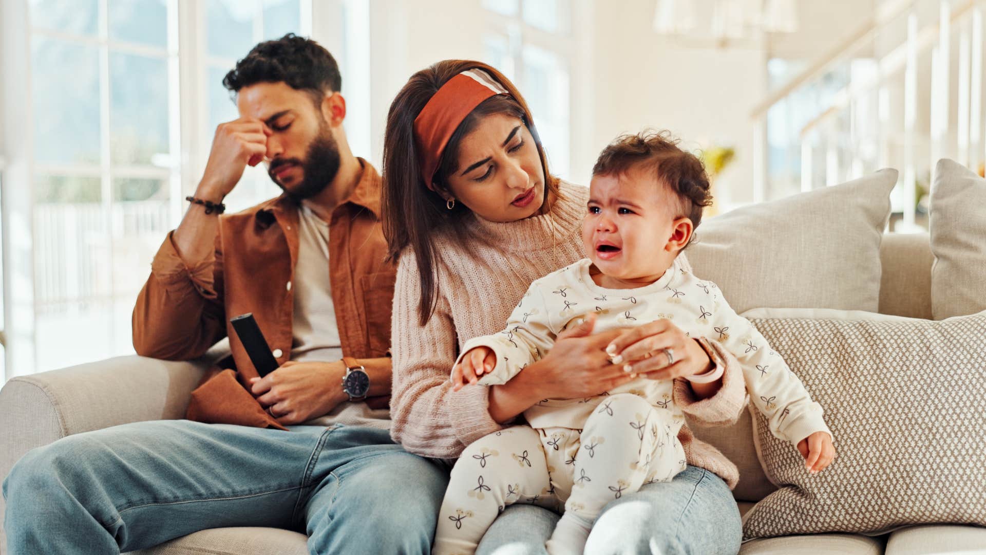 parents sacrificing a social life to take care of their baby