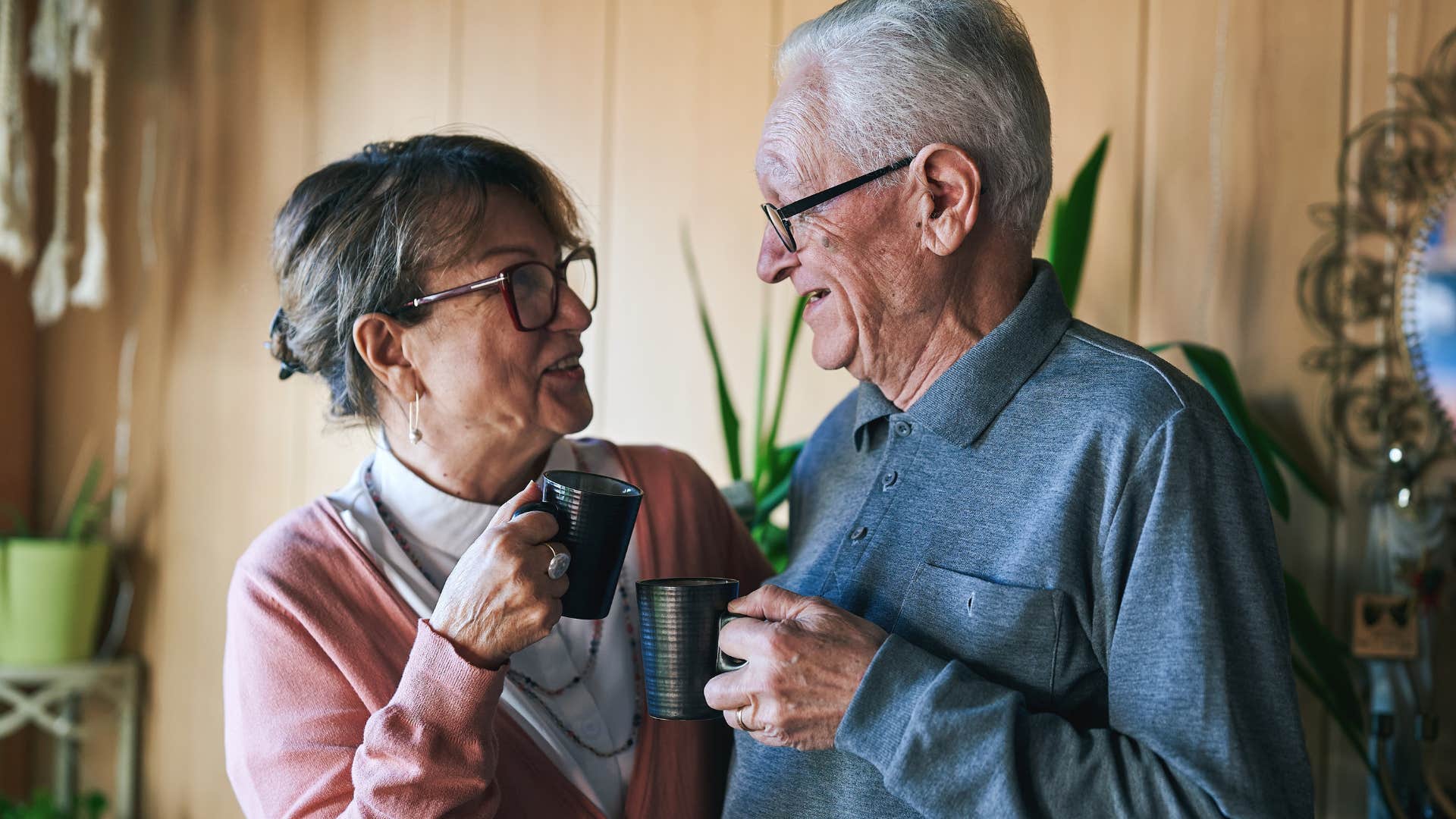 unhygienic couple sharing drinks and utensils at home