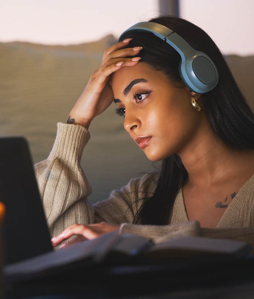 introverted person with laptop and head phones