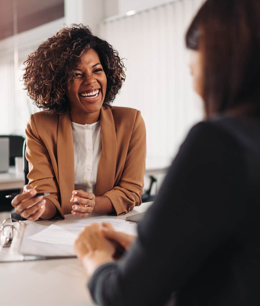 hiring manager smiles showing they found a match for the job