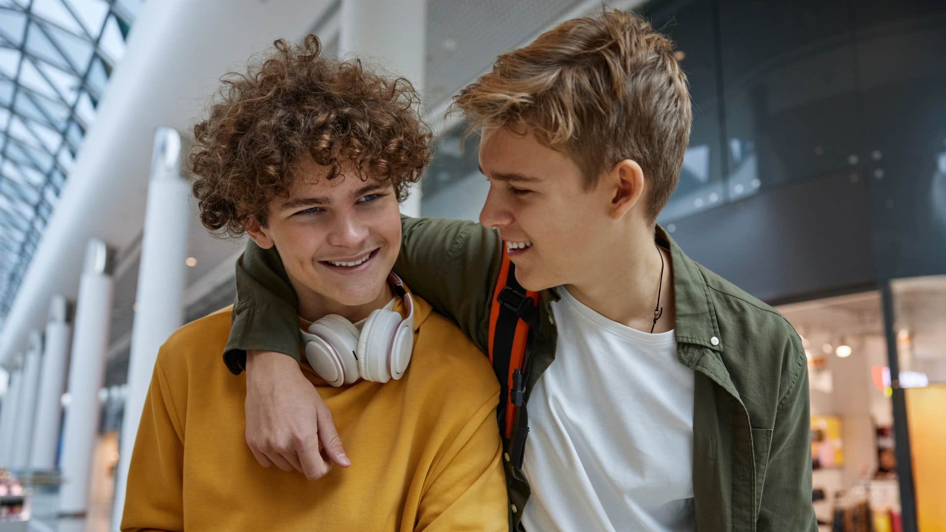 Happy teens show kindness to each other