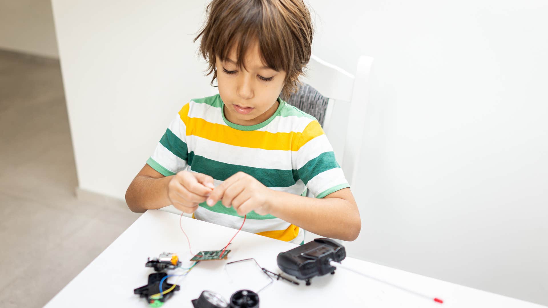 kid being allowed to fix things