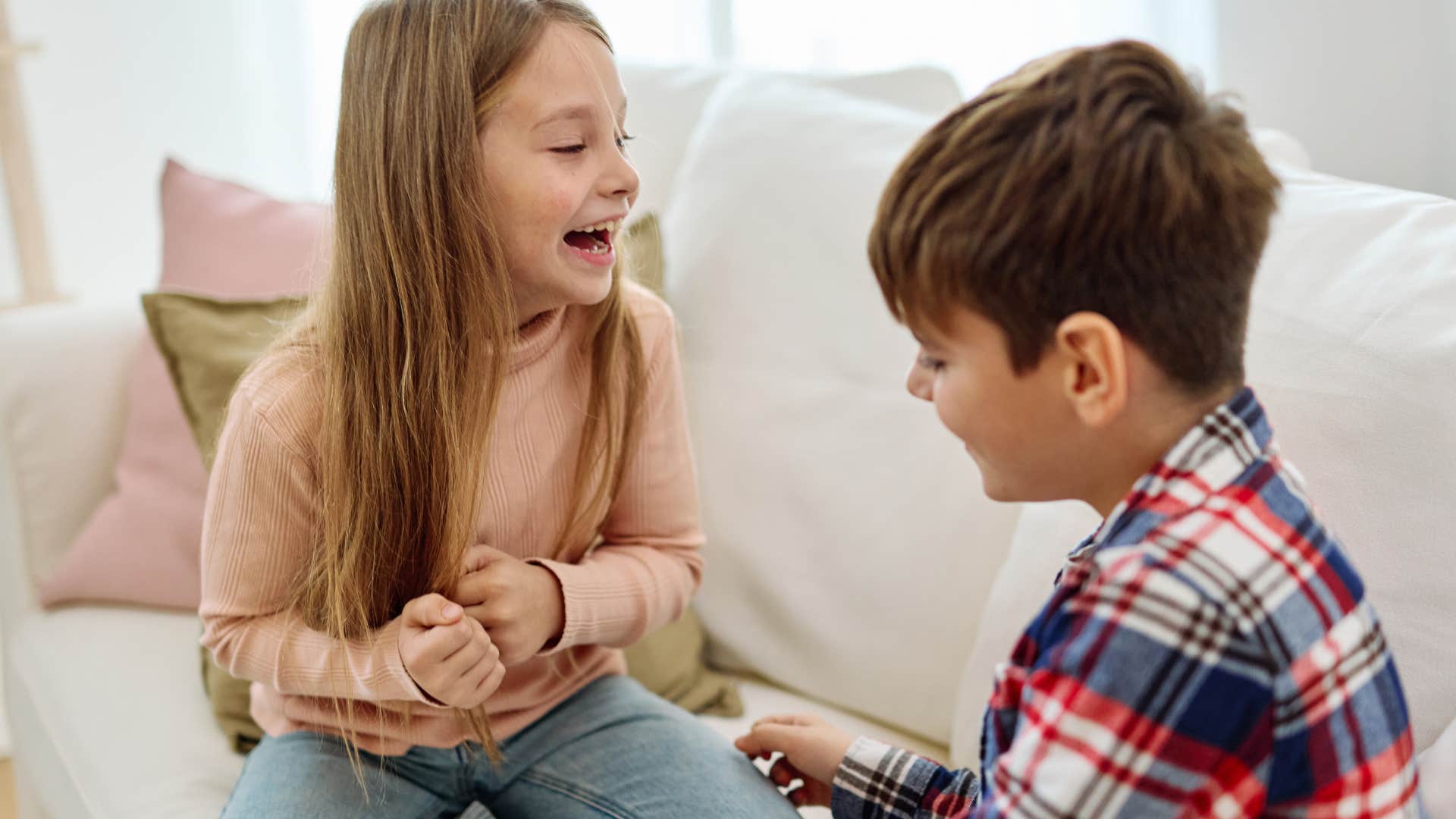 little girl having a play date with little boy