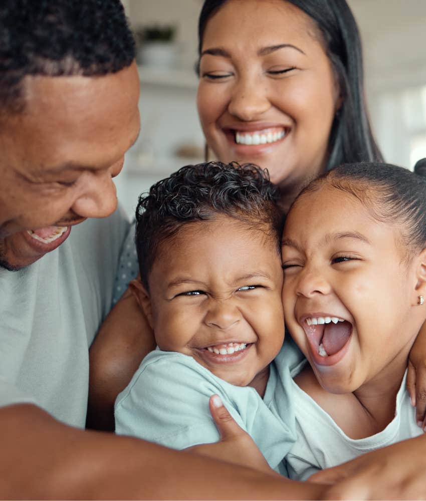 Happy family laughing showing life lesson