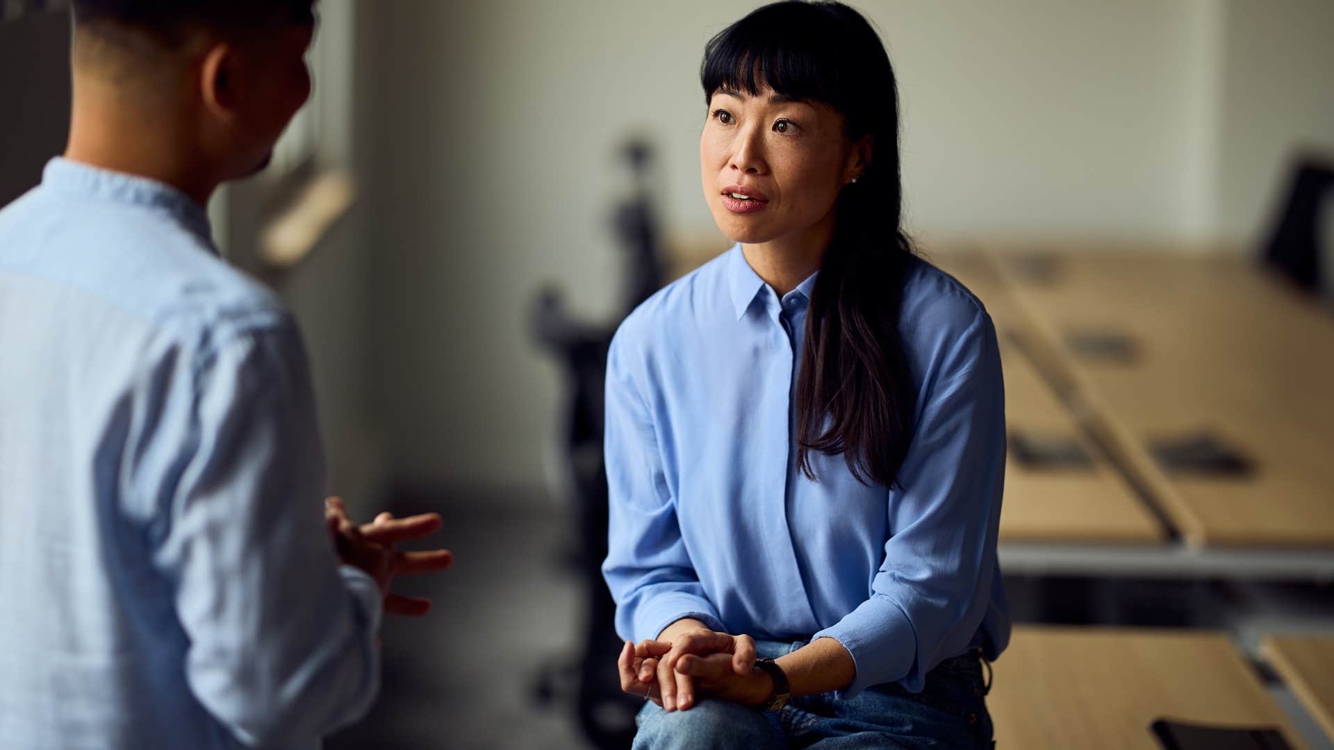 Woman who protects their personal space at work.