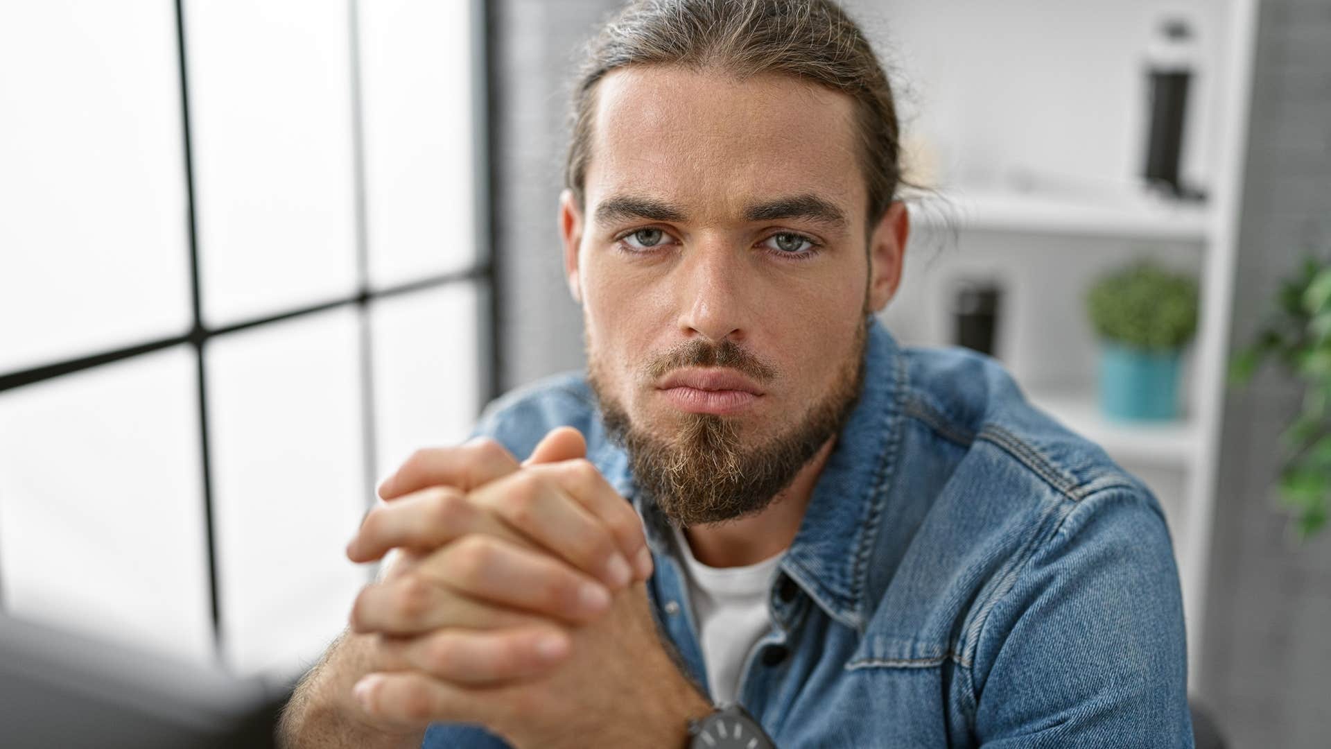 Man who wants to make things right looking at the camera.