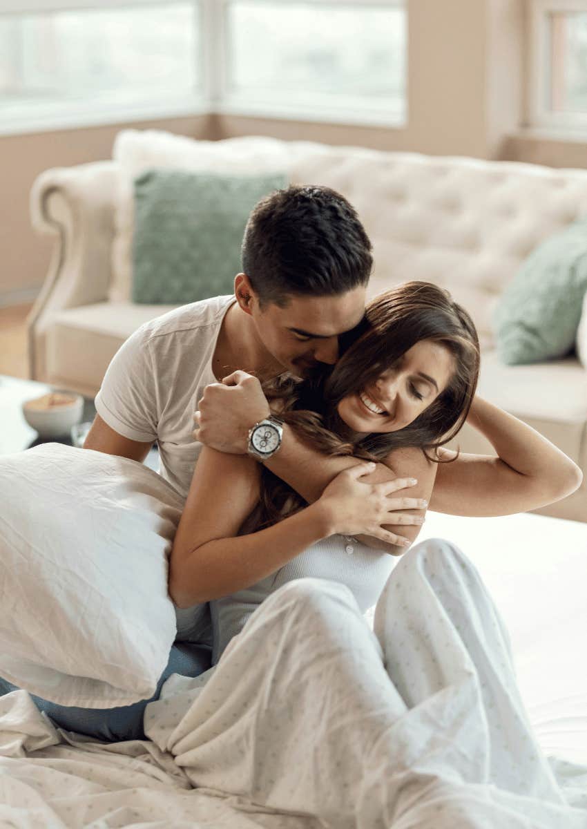 loving couple hugging each other close