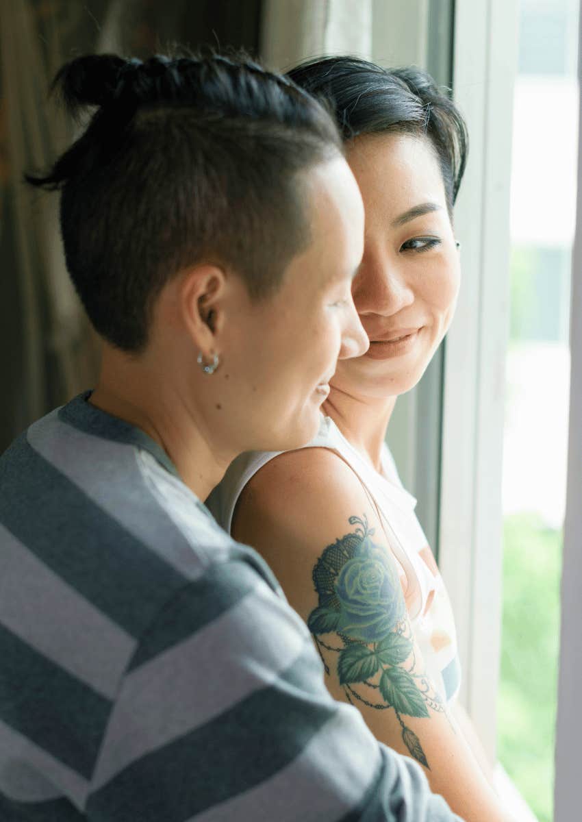 loving female couple hugging each other close