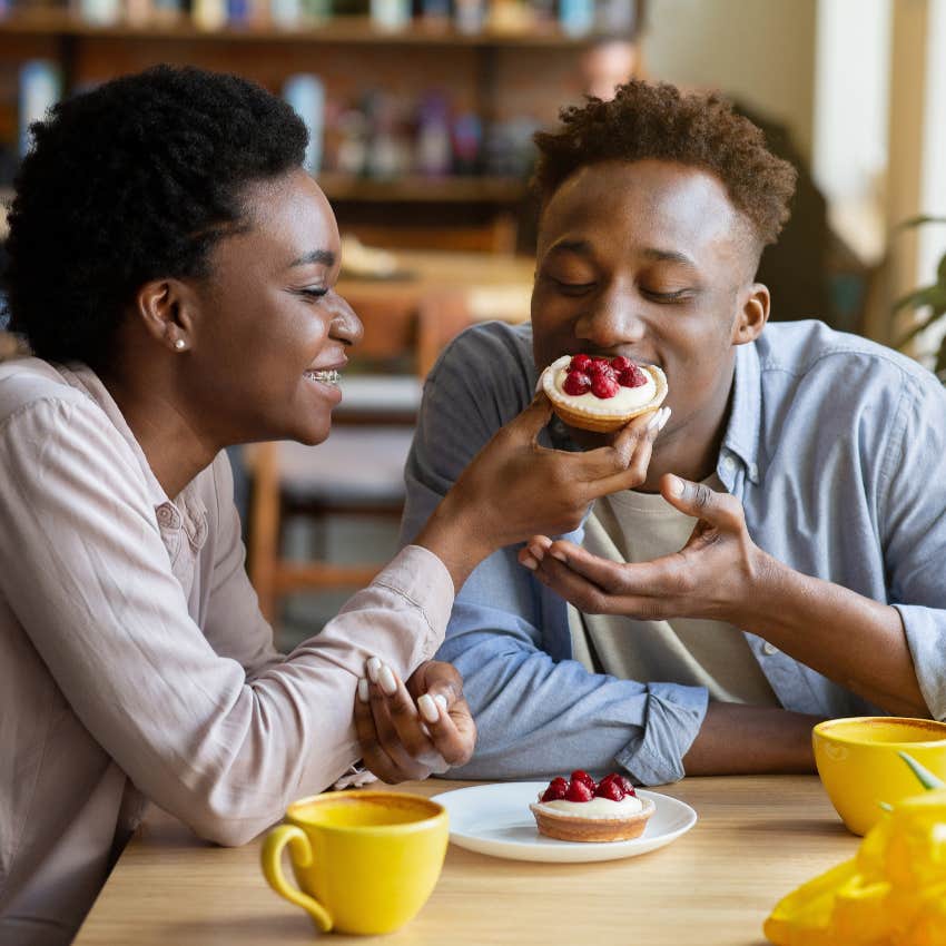 couple on a date connecting and not splitting the bill