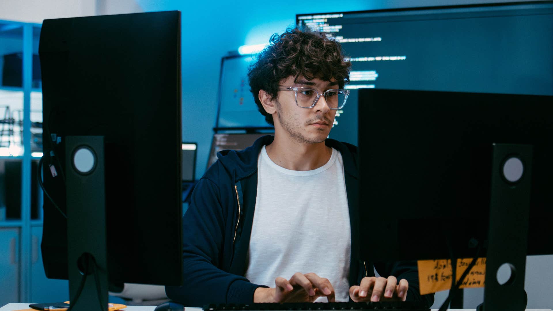 highly individualistic man working on computer by himself