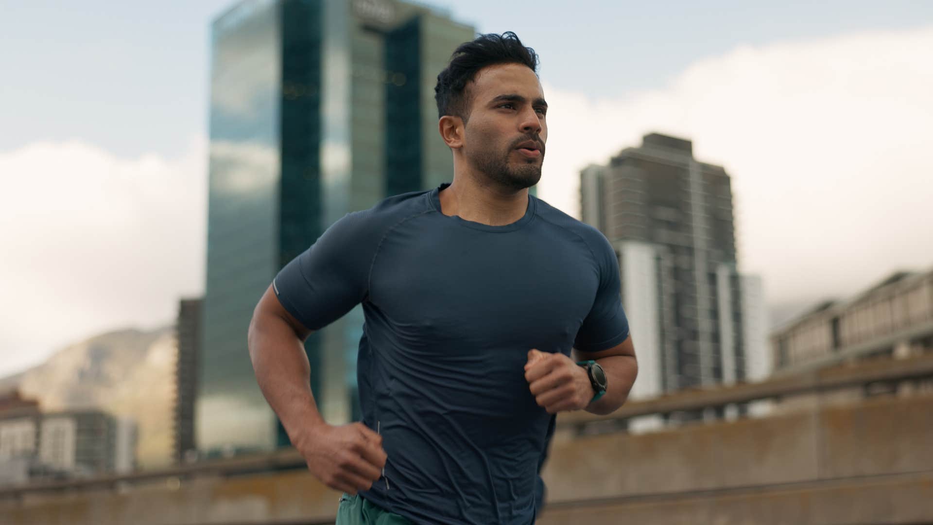 man running as part of his daily routine