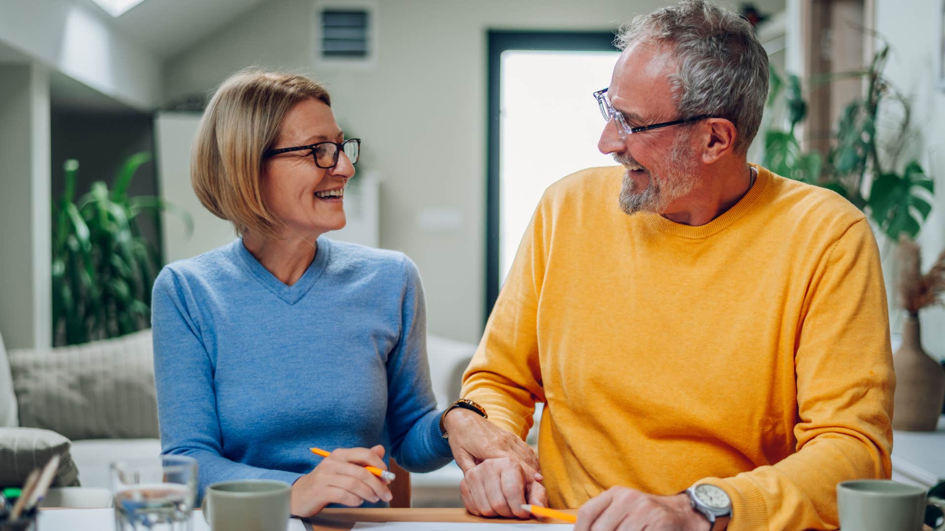 Man saying "How was your day?" to his wife.