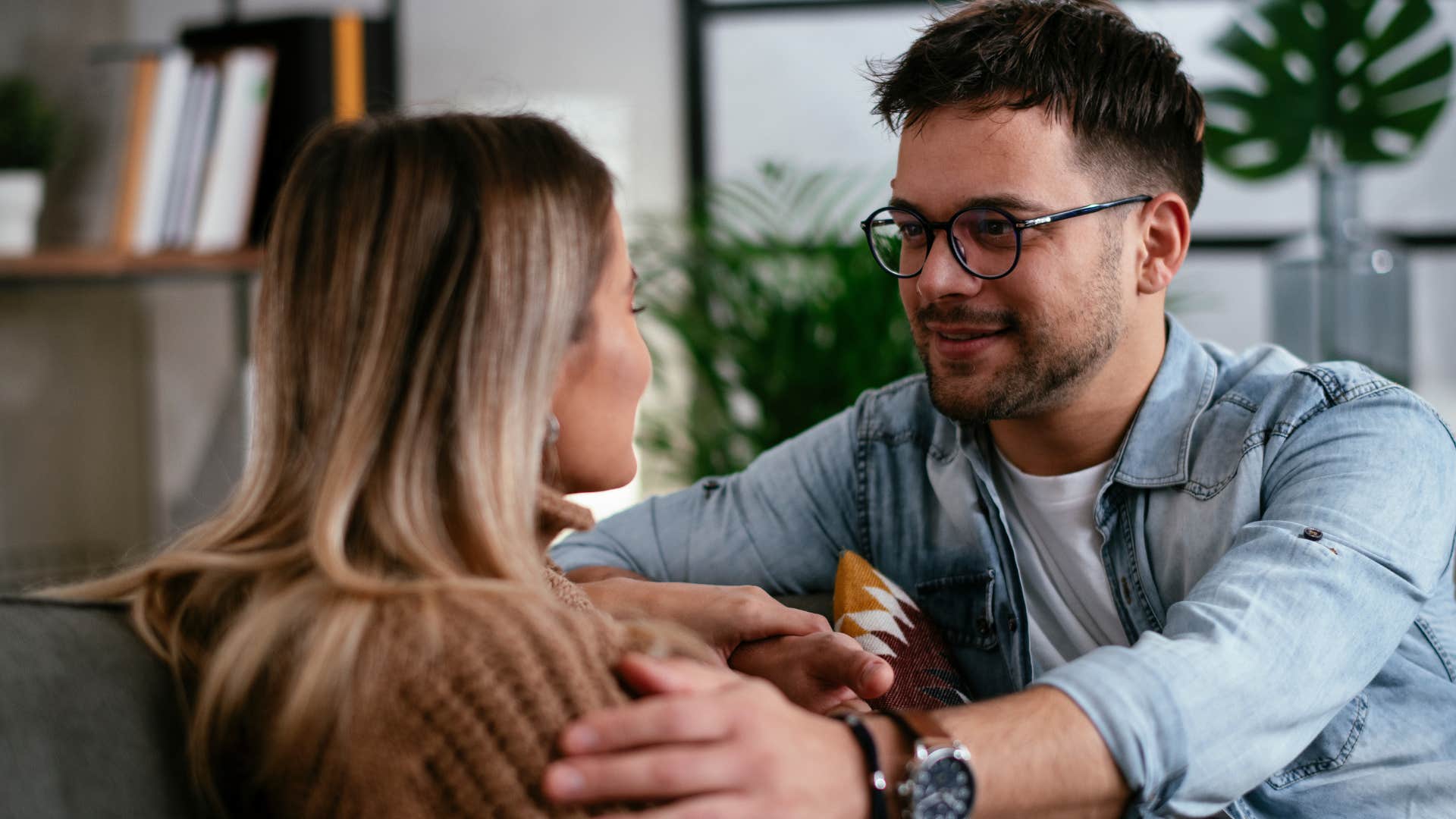 Man saying "tell me what happened" to his wife.