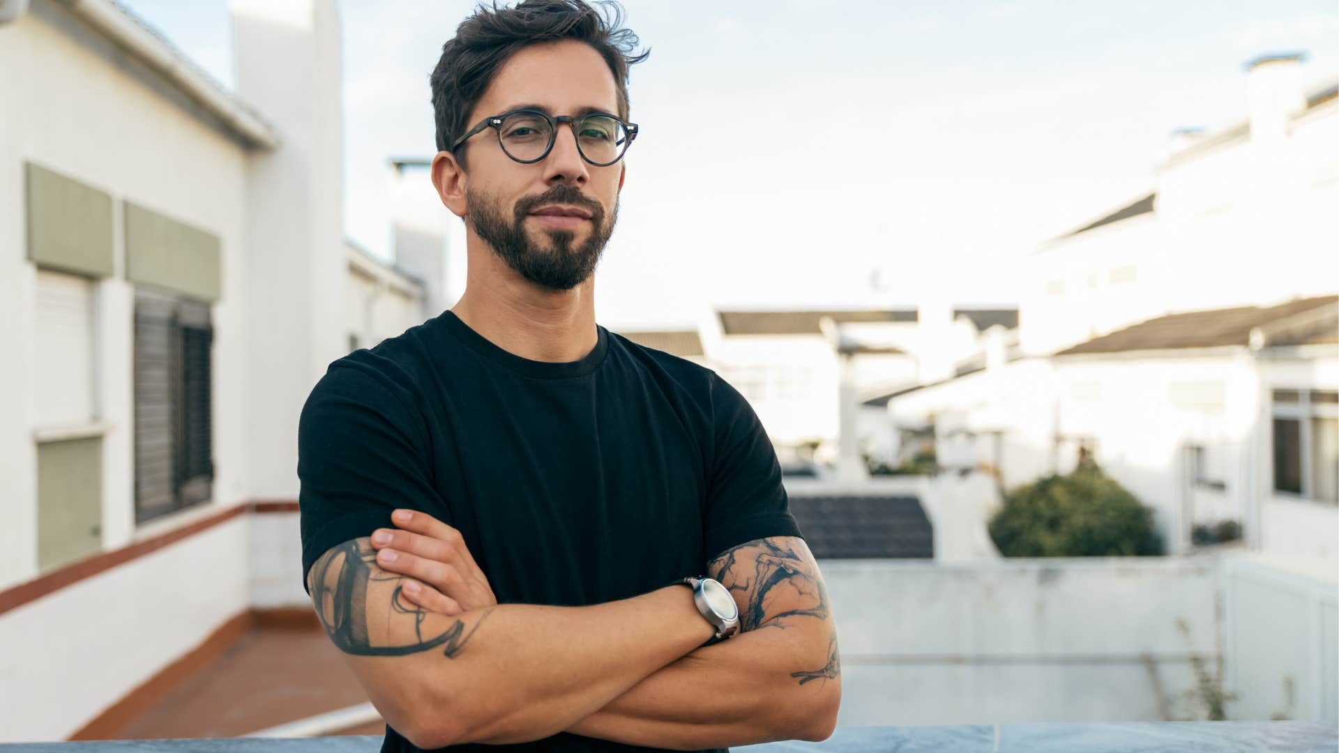 extroverted man smiling outside