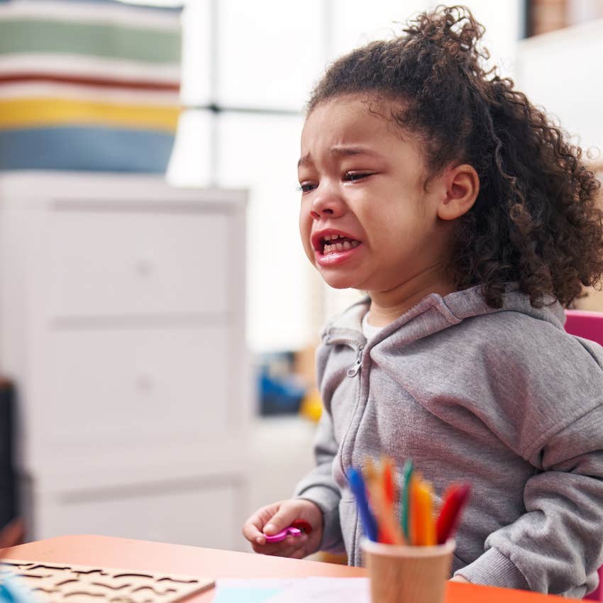 toddler having a fit at daycare
