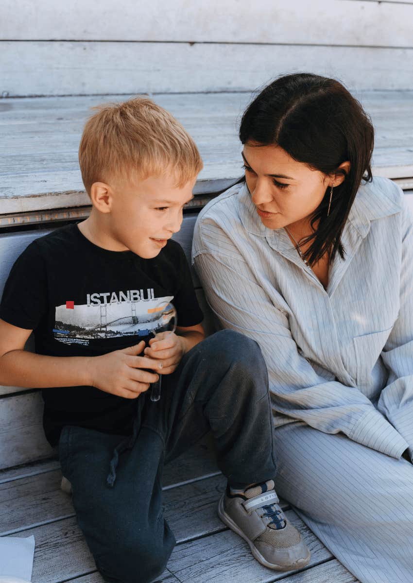 mom listening to young child
