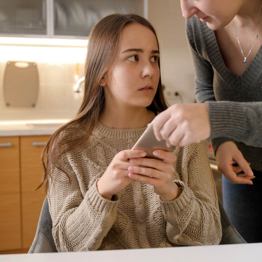 mom taking away teen's phone as punishment