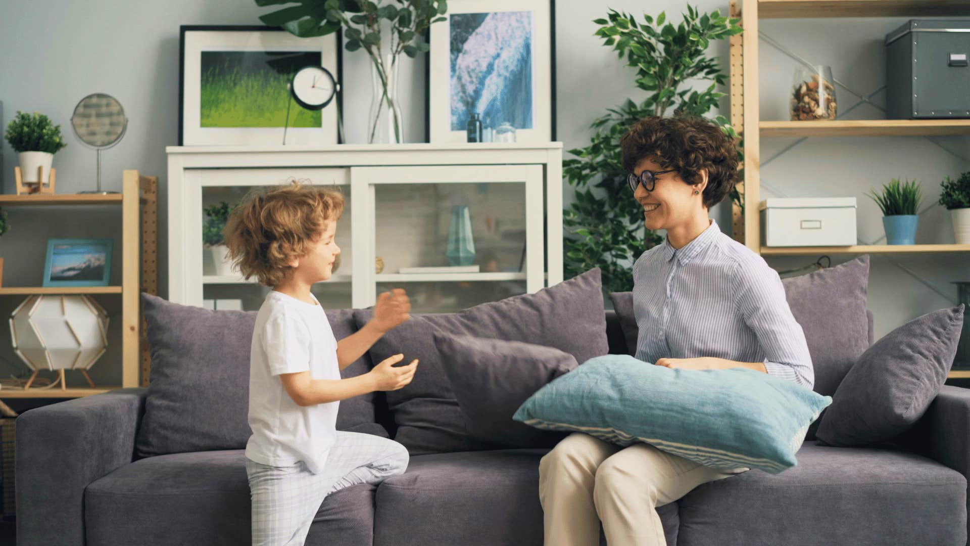 mom and son talking on couch