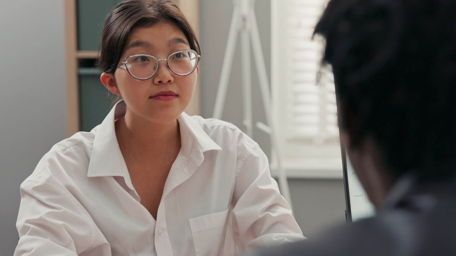 Gen Z woman overusing therapy speak at work