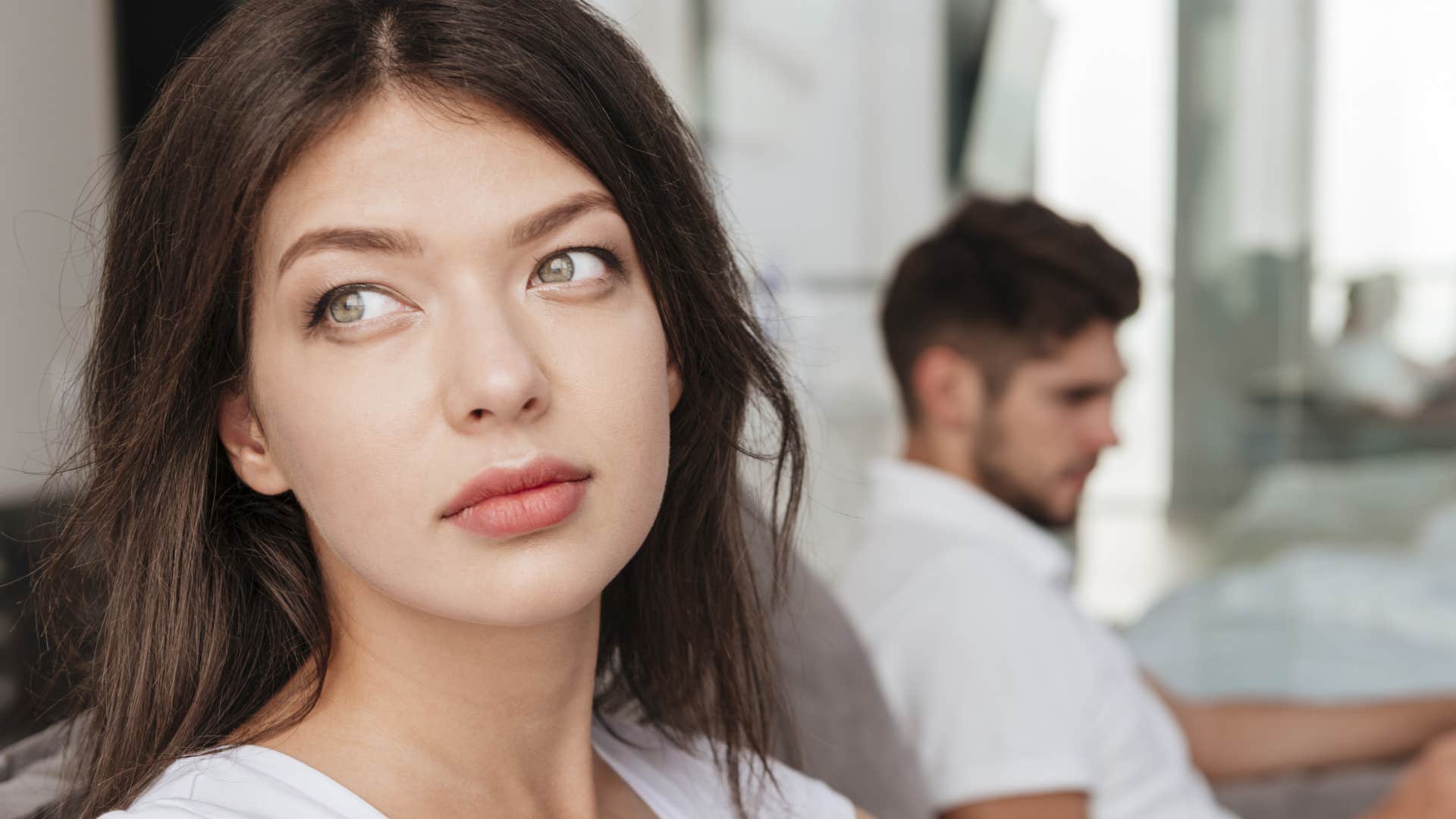 Gen Z woman playing hard to get with a man