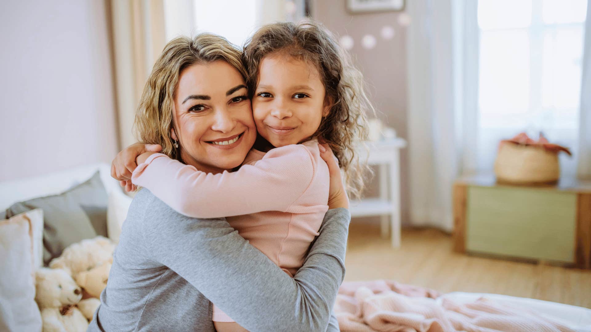mother and daughter hugging
