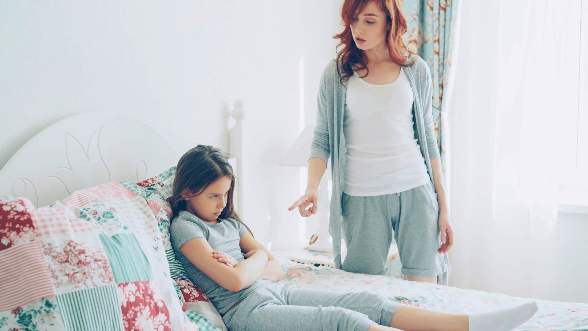 mother trying to protect upset daughter