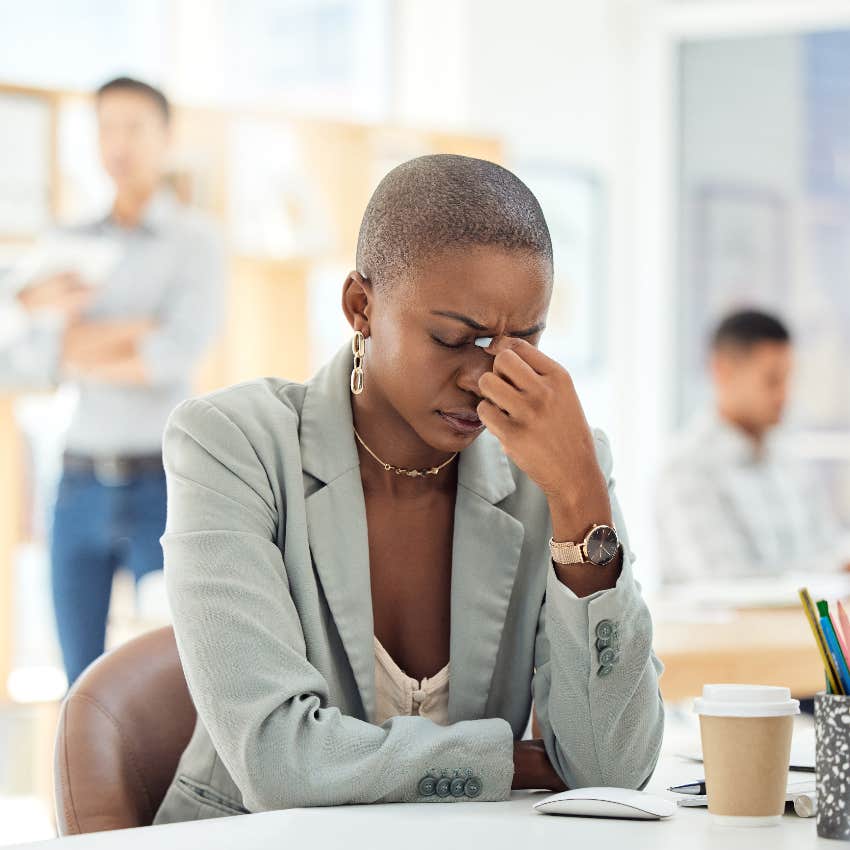 businesswoman stressed at work with additional tasks