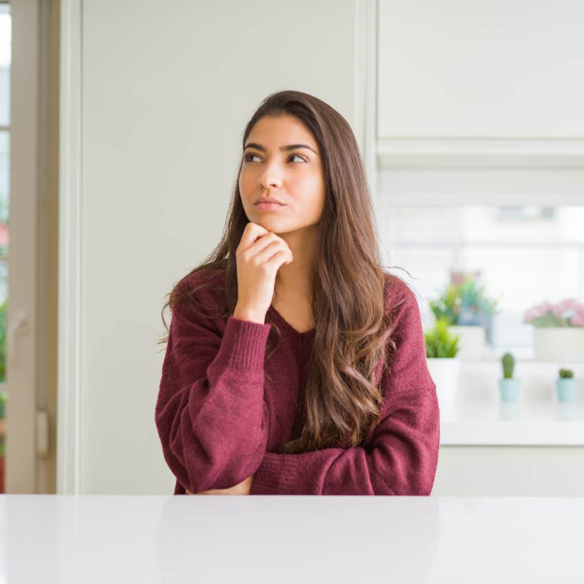 thoughtful woman using metacognition